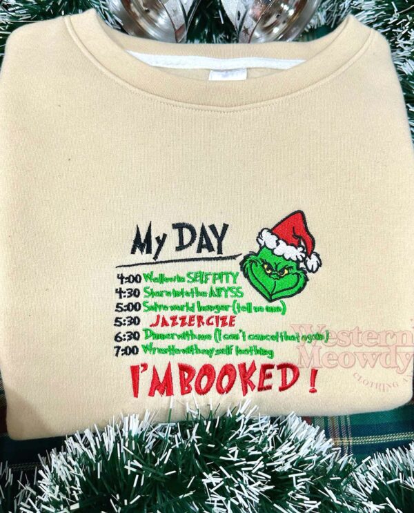 Grinch I’m Booked Embroidered Sweatshirt