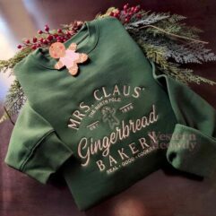 Mrs Claus Gingerbread The North Pole Embroidered Crewneck Mrs Claus Gingerbread The North Pole Embroidered Crewneck