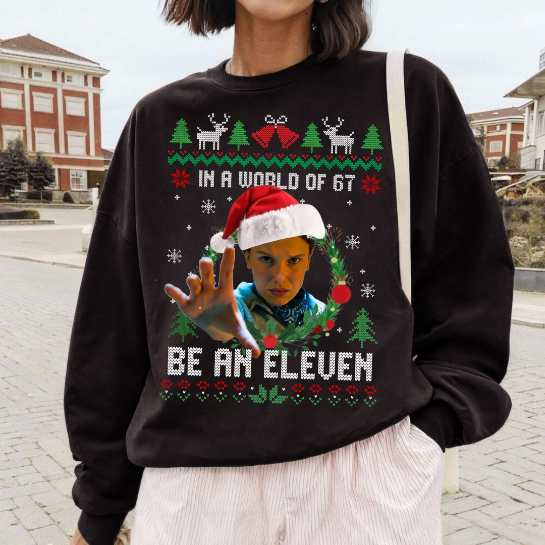 In A Worl Full Of 67 Be An Eleven Ugly Sweatshirt – Movie Merch – Gift For Fan In A Worl Full Of 67 Be An Eleven Ugly Sweatshirt – Movie Merch – Gift For Fan